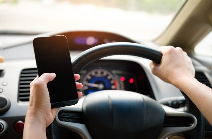 Distracted Driving in Ontario: New Penalties and the Real Insurance Impact